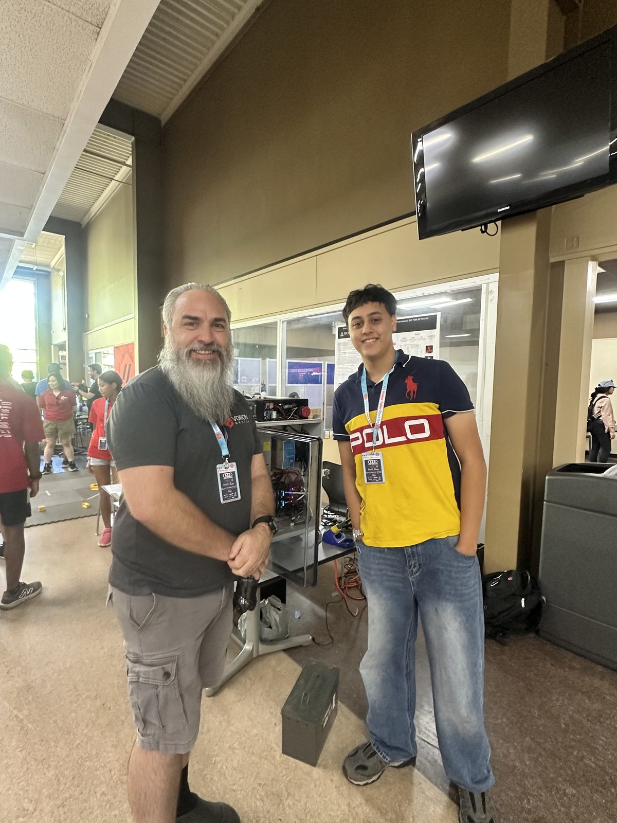 Me showing the Boaz printer to a visitor at Maker Faire Rocklin