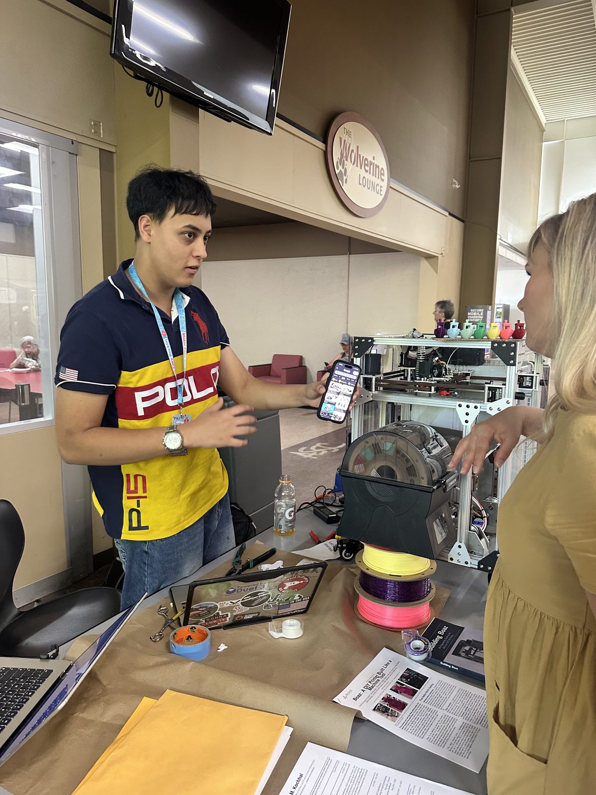 Me showing the Boaz printer to a visitor at Maker Faire Rocklin