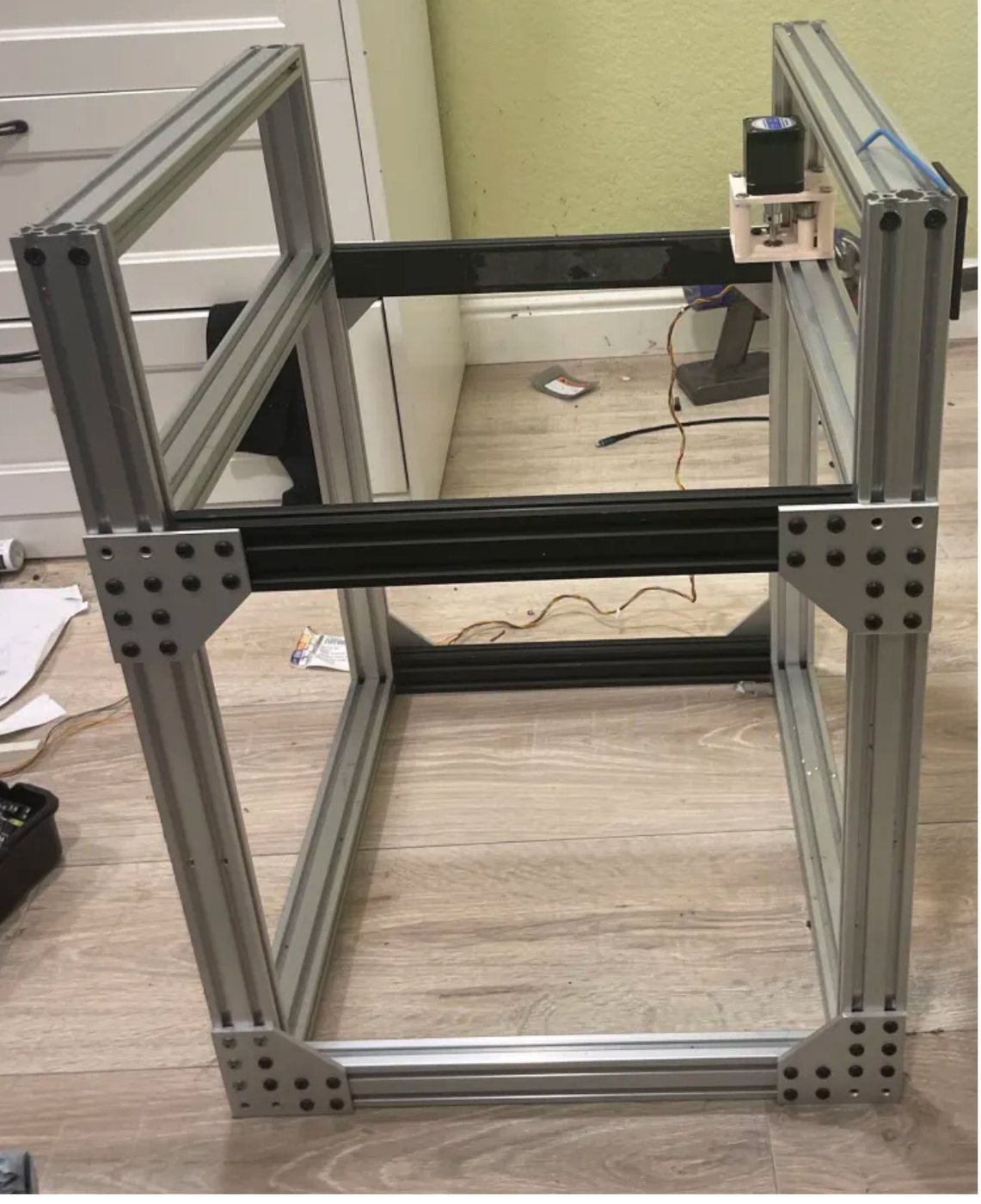 Aluminum frame with a printed PLA mock-up of the motion system